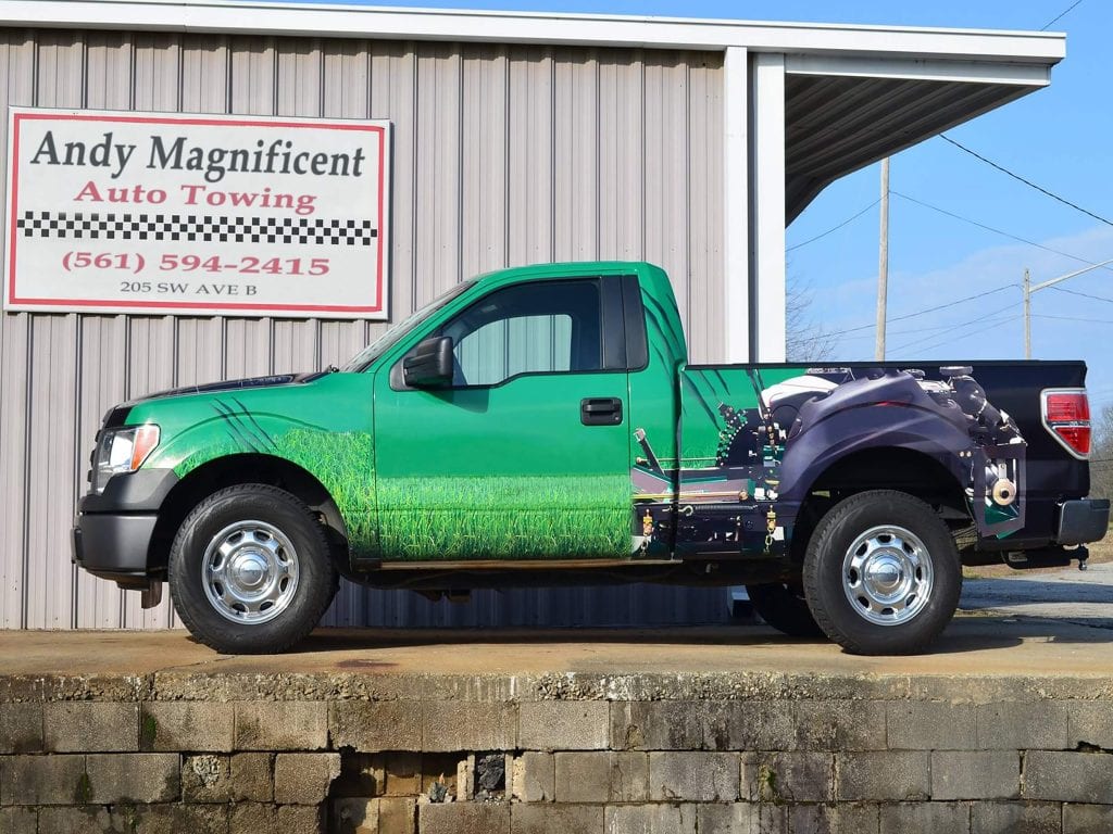 Andy Magnificent Auto Towing sign in Belle Glade, FL